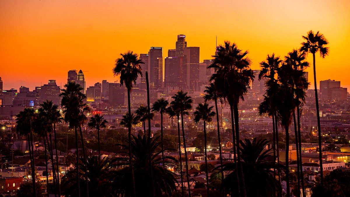 Los Angeles skyline at sunset with palm trees, California ESA laws